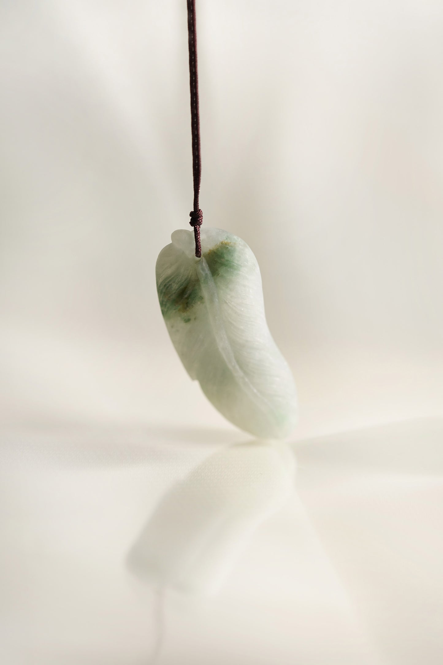 Carved Leaf White Jadeite Pendant with Medium Green patches