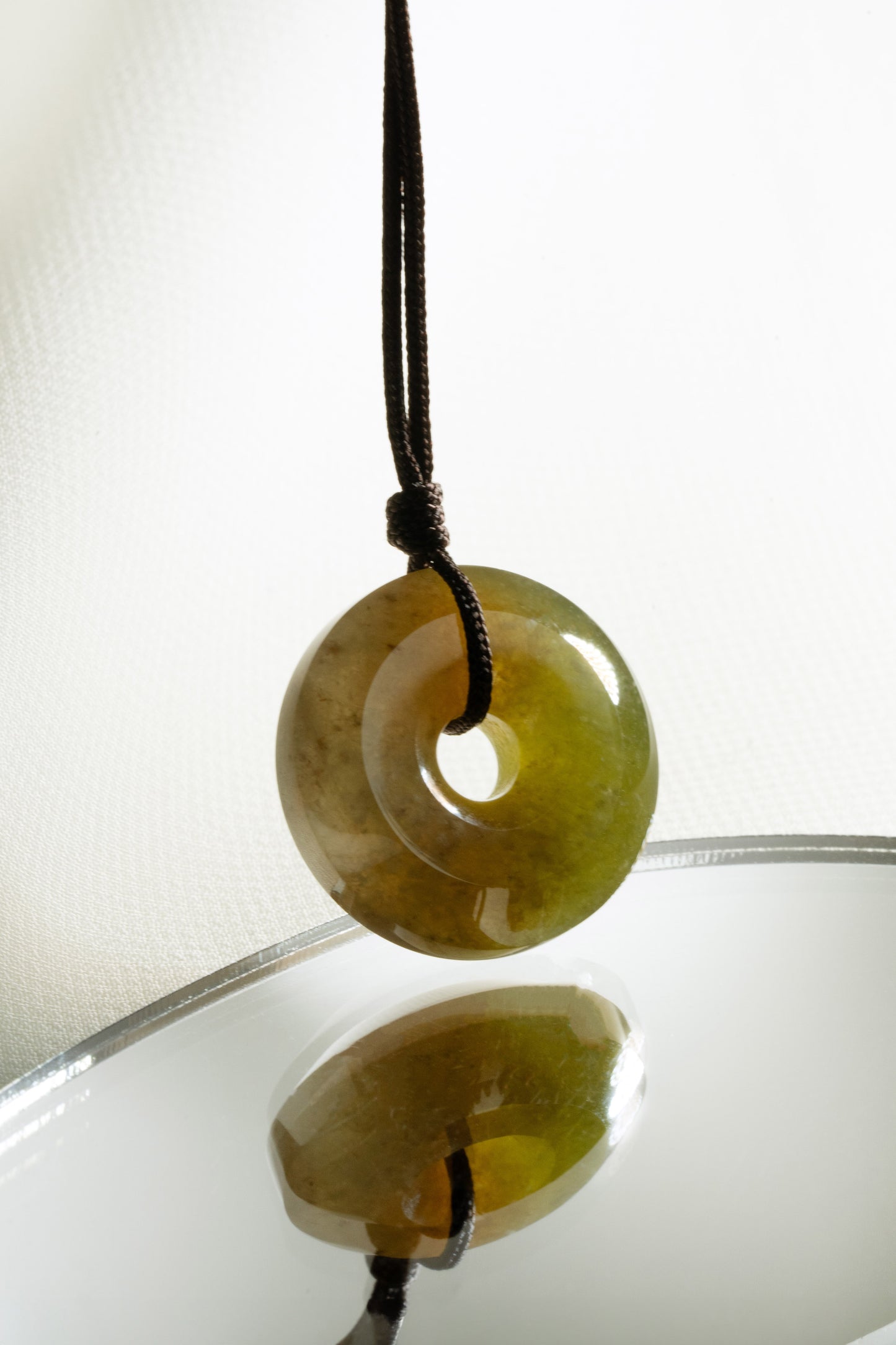 Brownish Yellow Jadeite Zen Doughnut with Bluish Green patches