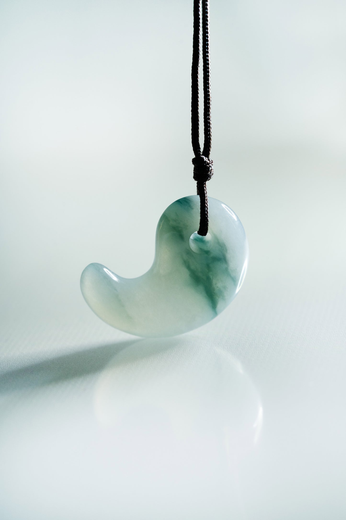 Pale Bluish Green Jadeite Comma with Medium Bluish Green patches