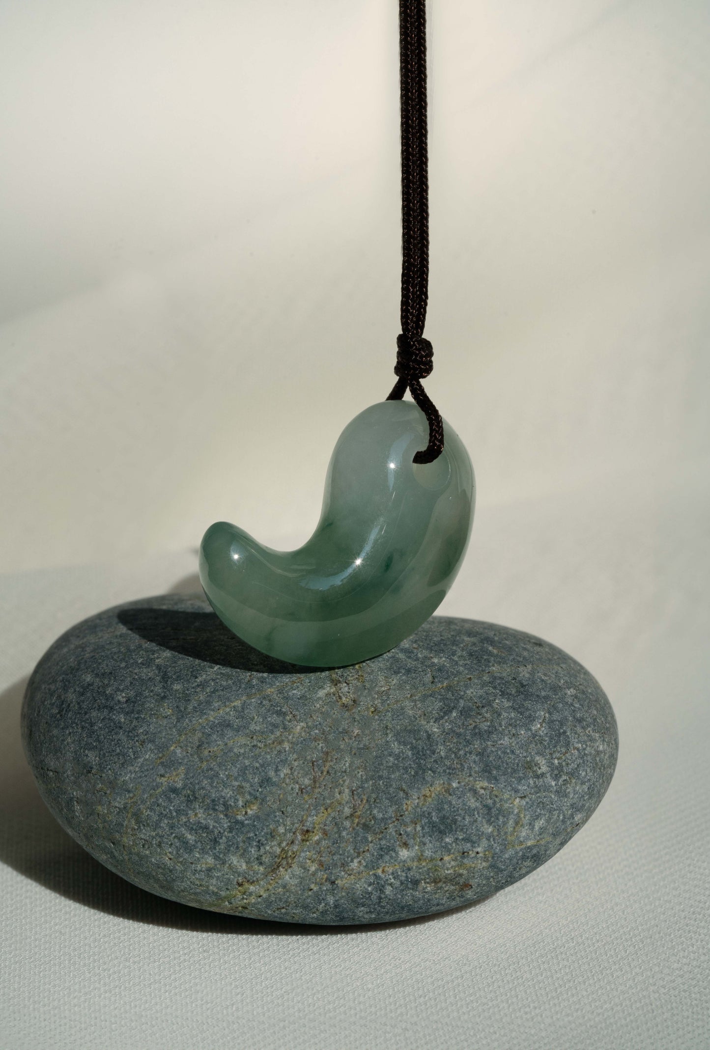 White Jadeite Comma with Bluish Green patches