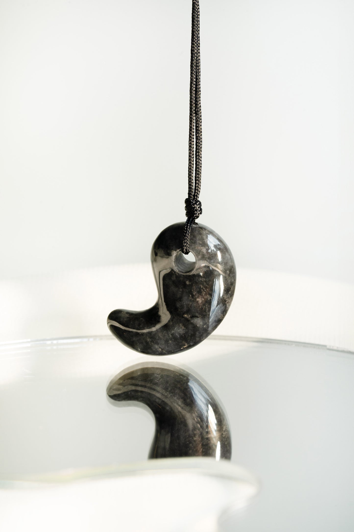 Black Jadeite Comma with Grey spots