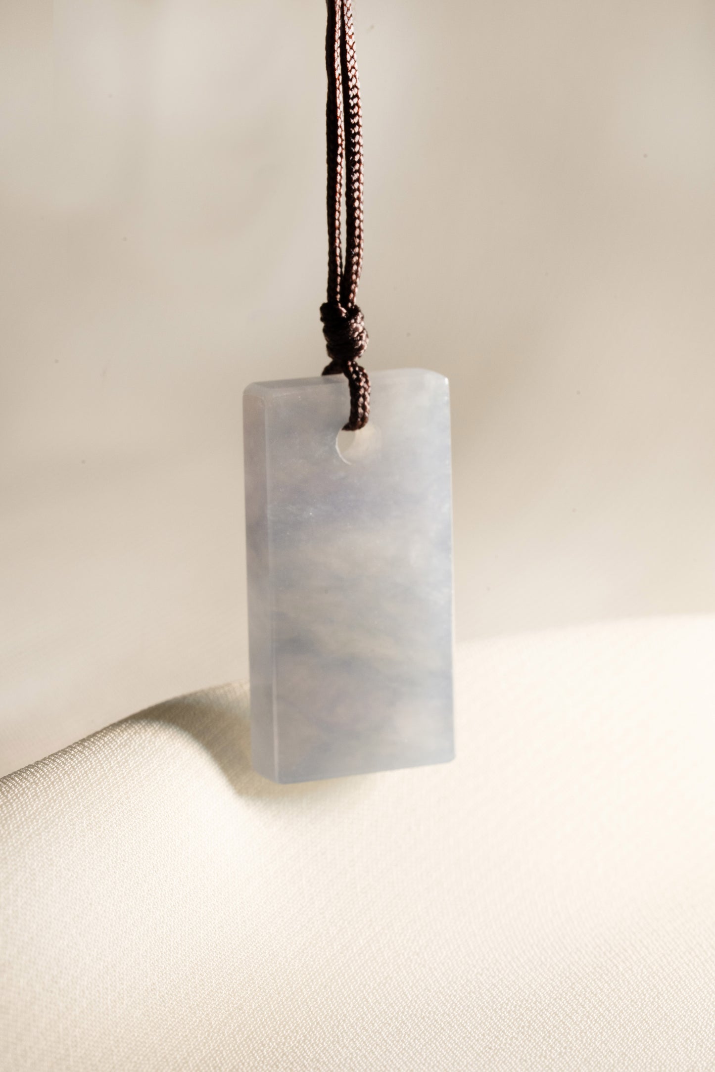 White Jadeite Tag with Pale Purple patches