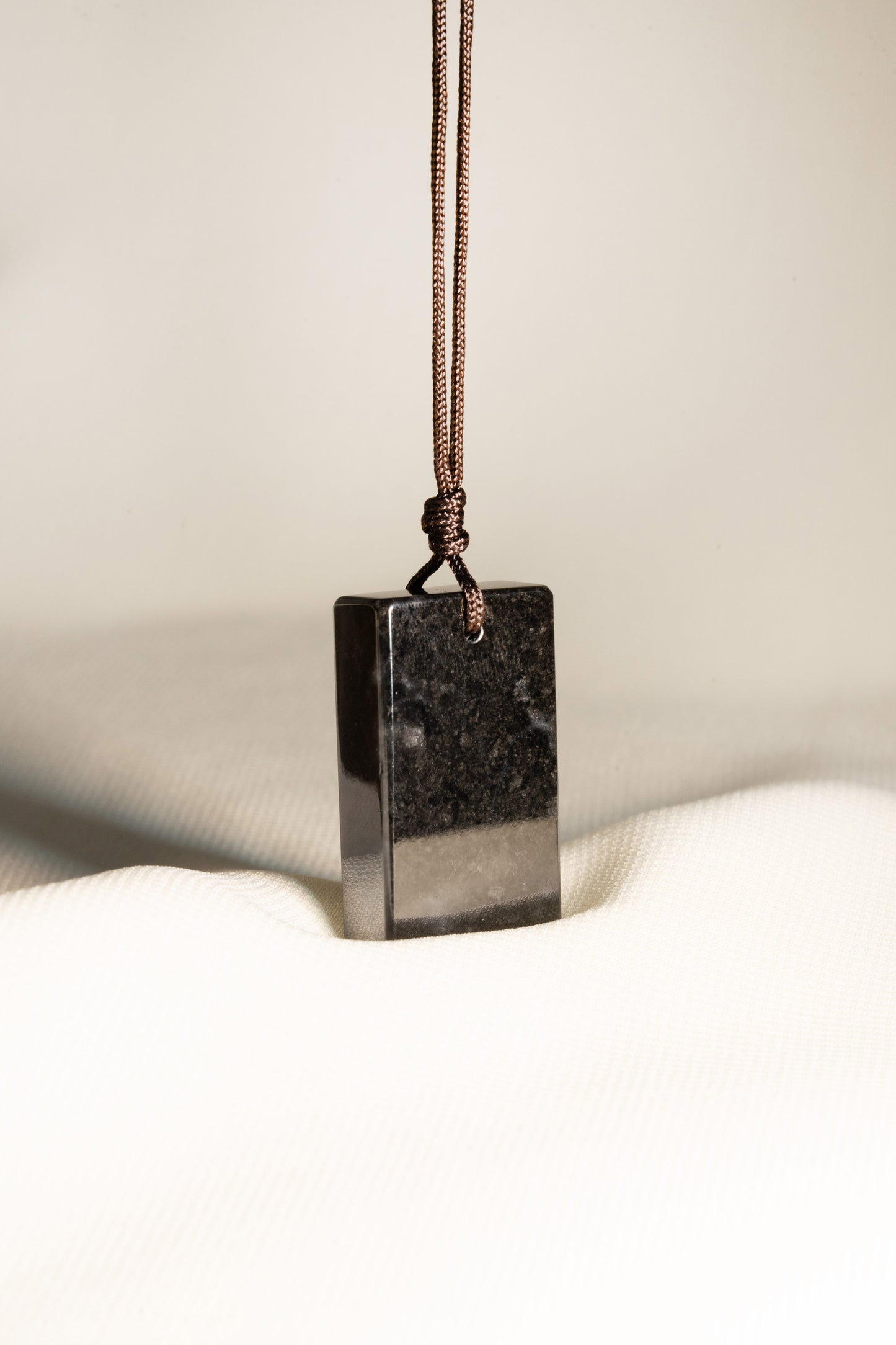 Black Jadeite Tag with White patches string with Adjustable Knot