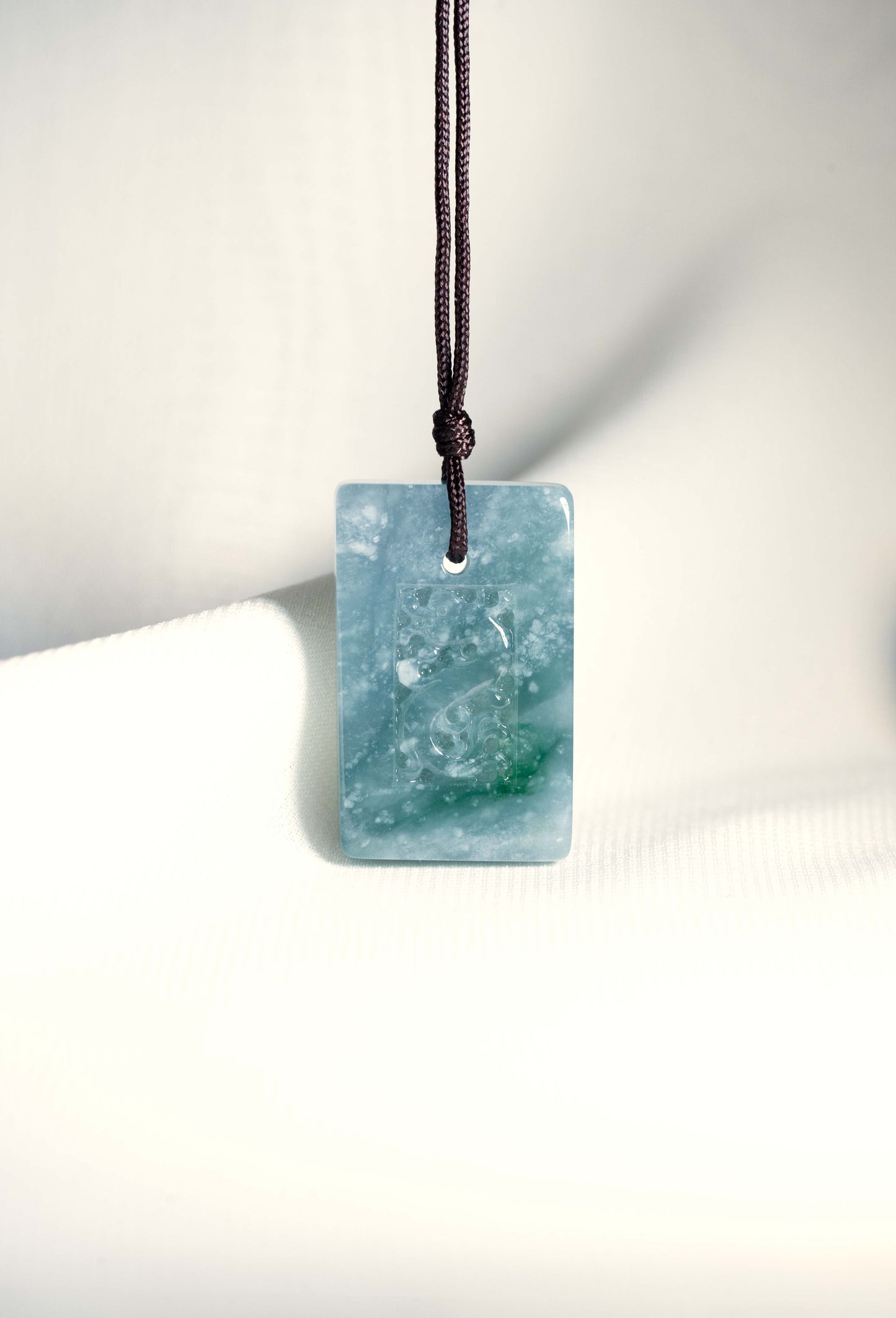 Medium Bluish Green Jadeite Tag with Engraved Dragon