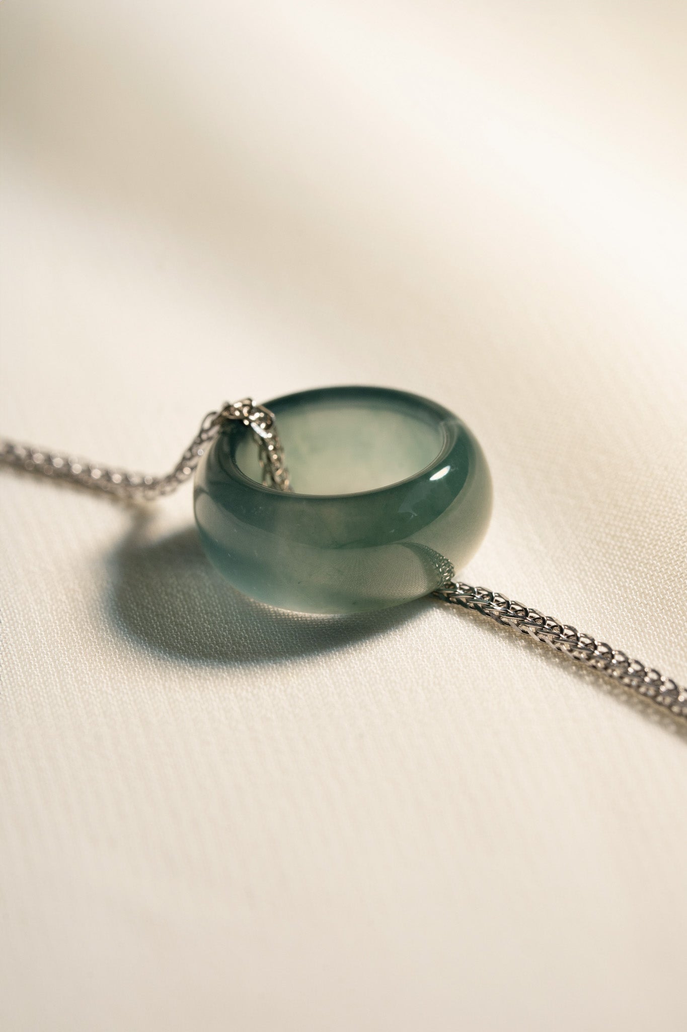 Deep Bluish Green Jadeite Ring Pendant on a 925 Silver Chain