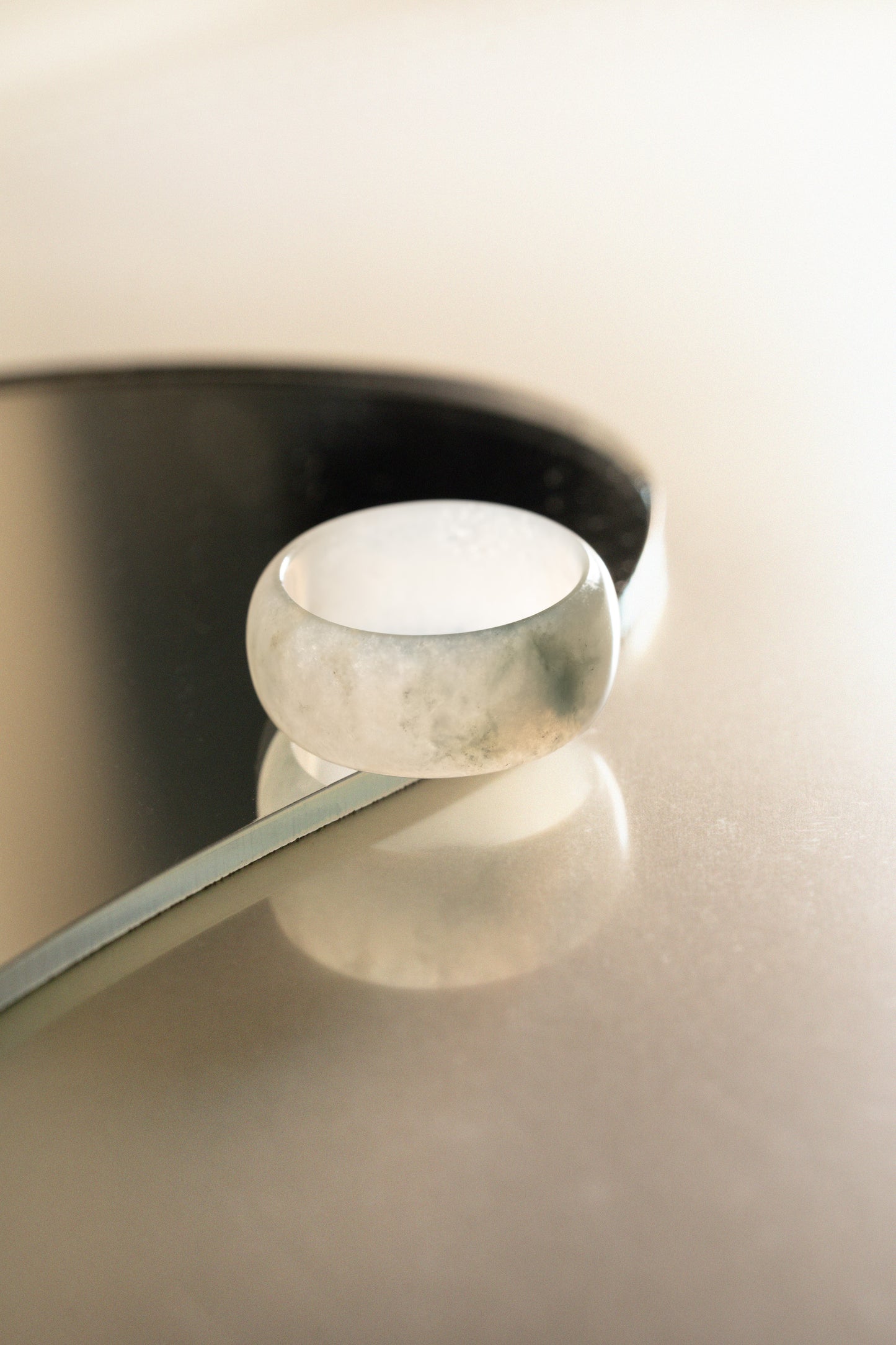 White Jadeite Ring with Bluish Green patches