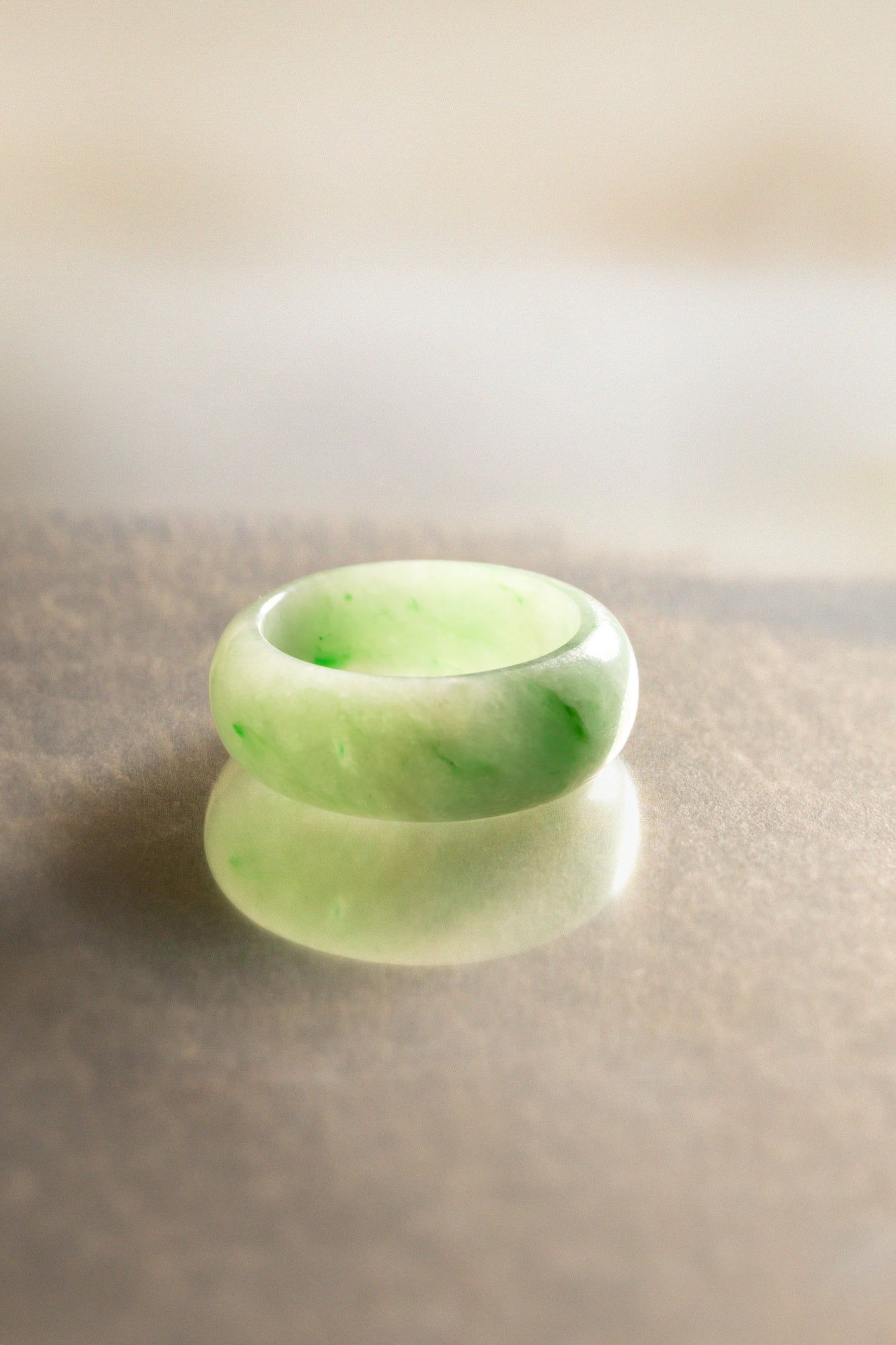 Pale Green Jadeite Ring with Light and Medium Green patches