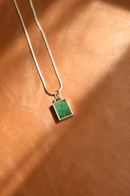 Intense Green Jadeite Tag with 18K White Gold Pendant hung on a 925 Silver Chain