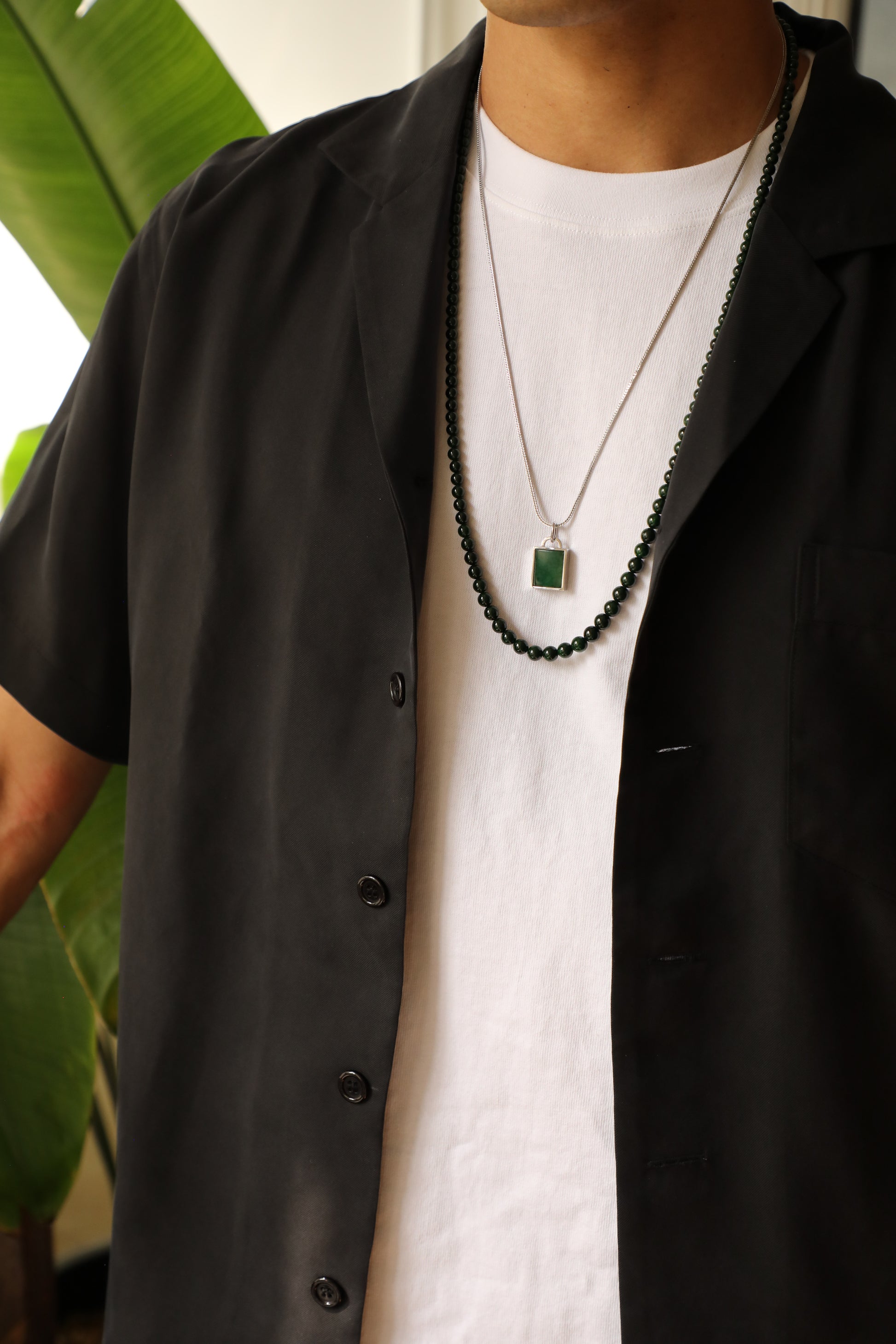 Intense Green Jadeite Tag with 18K White Gold Pendant hung on a 925 Silver Chain matches with Intense Green Jadeite Necklace