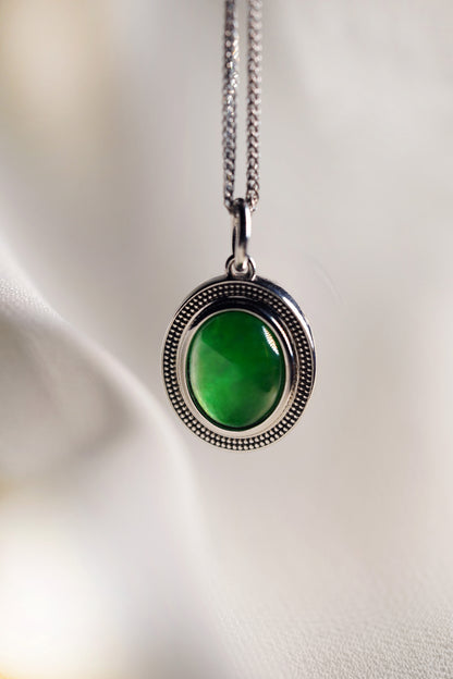 Oval Intense Green Jadeite with 18K White Gold Pendant hung on a 925 Silver Chain