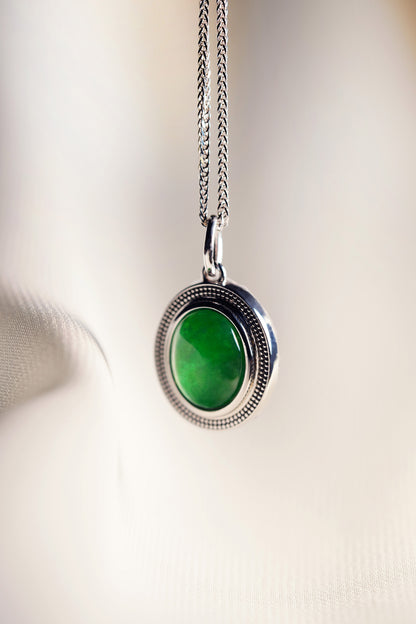 Oval Intense Green Jadeite with 18K White Gold Pendant hung on a 925 Silver Chain
