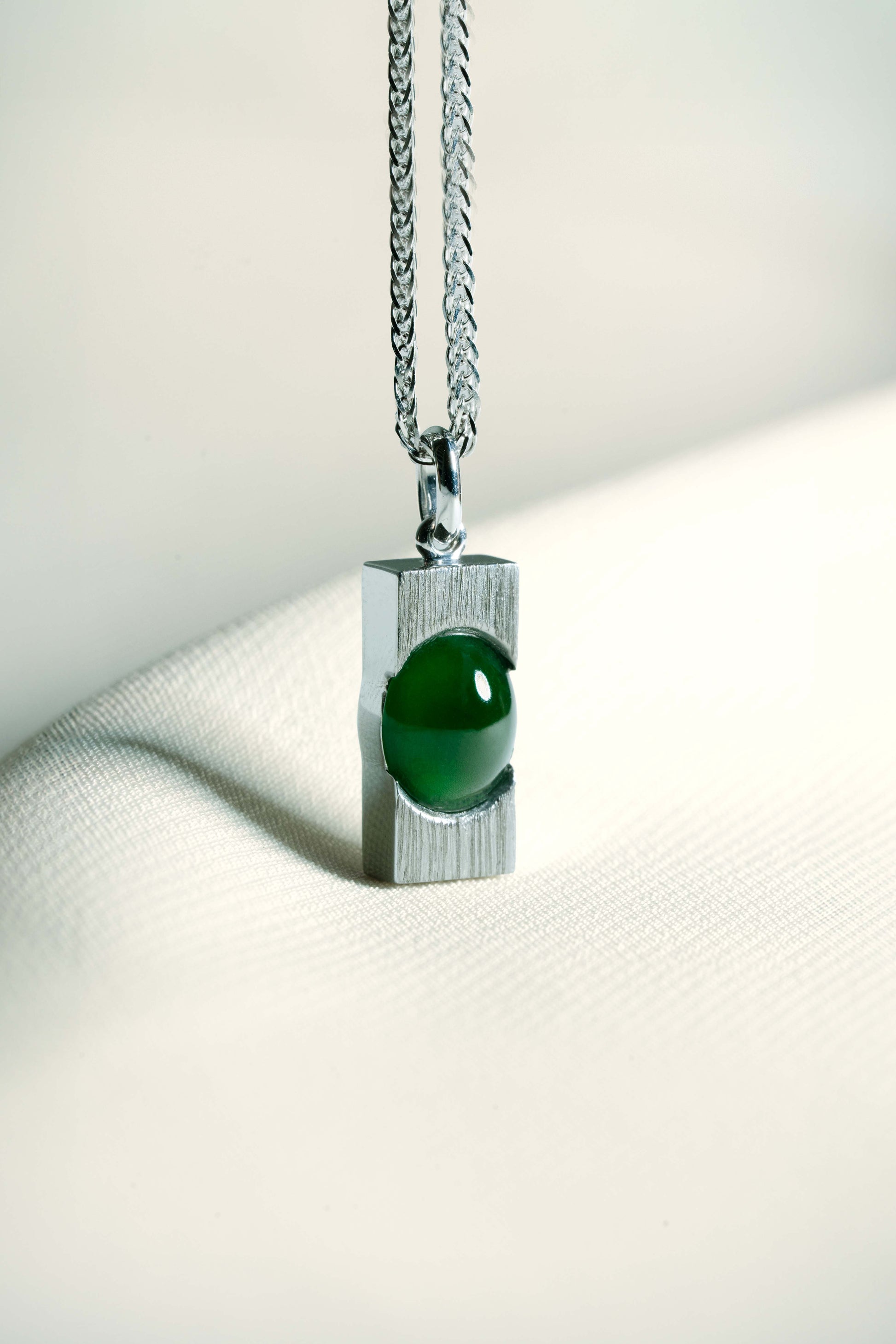Pale Green Jadeite with Light Green patches with 18K White Gold Pendant hung on a 925 Silver Chain