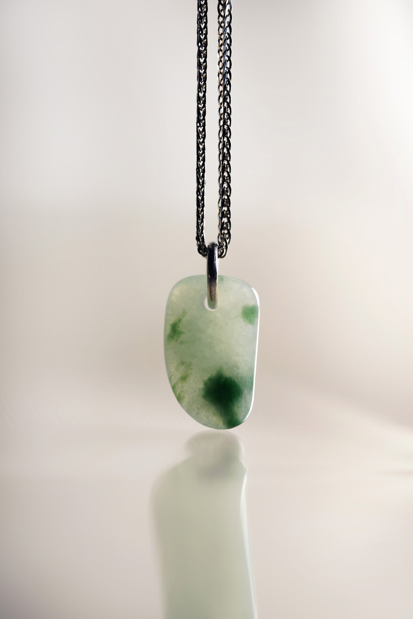 Green Jadeite with Bluish Green patches added with 18K White Gold Pendant hung on a 925 Silver Chain