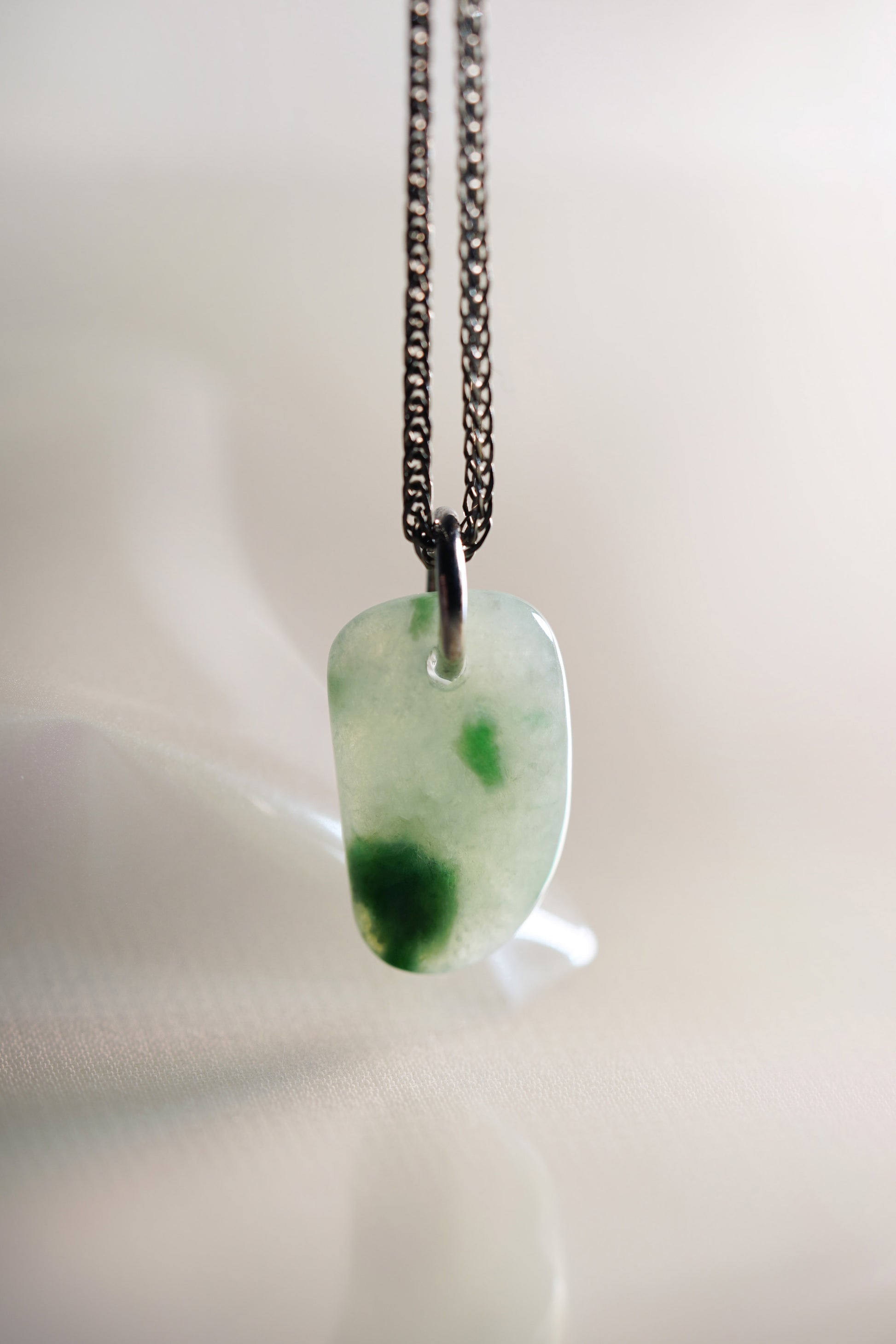 Green Jadeite with Bluish Green patches added with 18K White Gold Pendant hung on a 925 Silver Chain