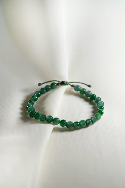 Pale Bluish Green Jadeite Bead Bracelet with Deep Green patches