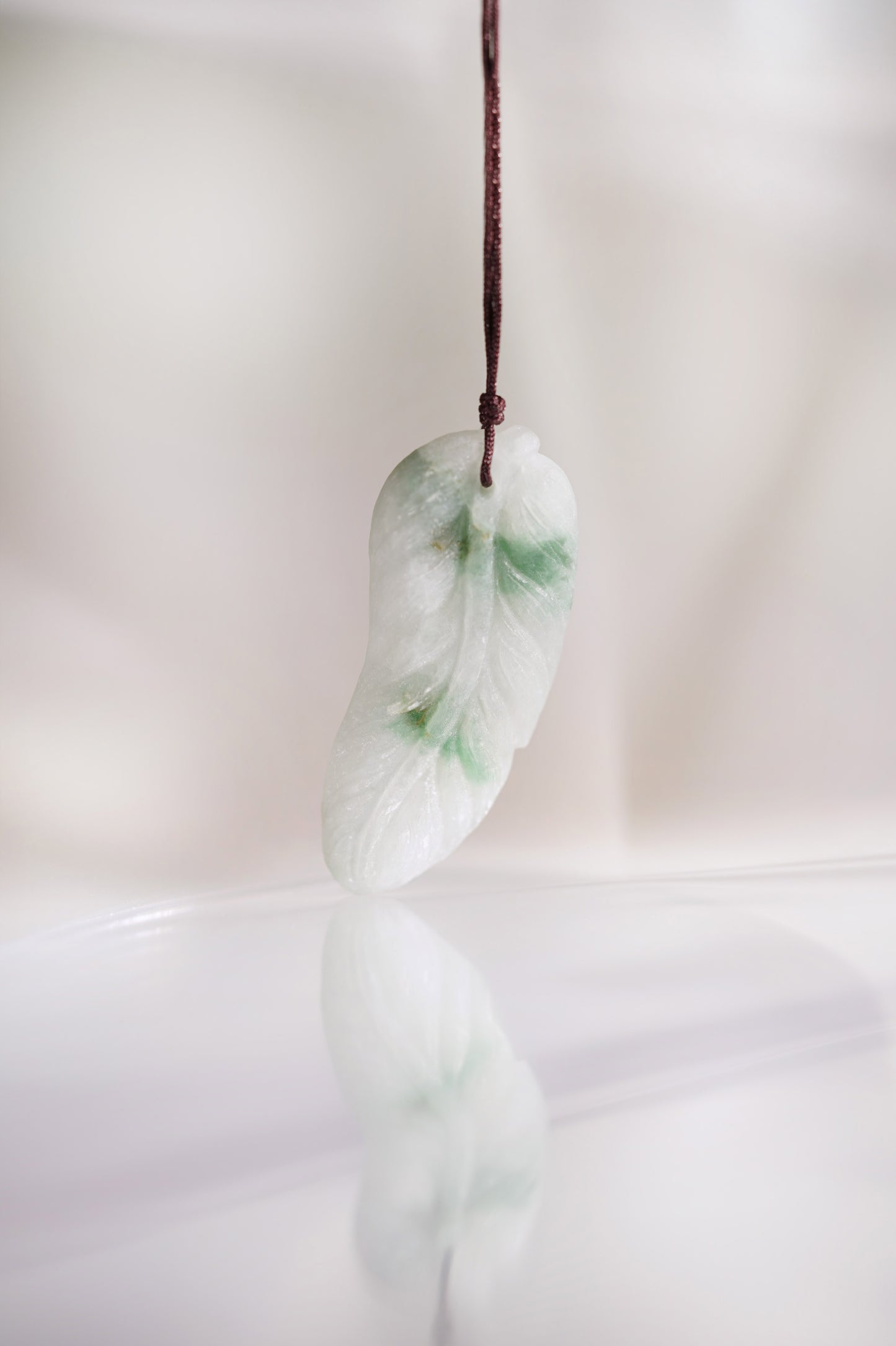 Carved Leaf White Jadeite Pendant with Medium Green patches