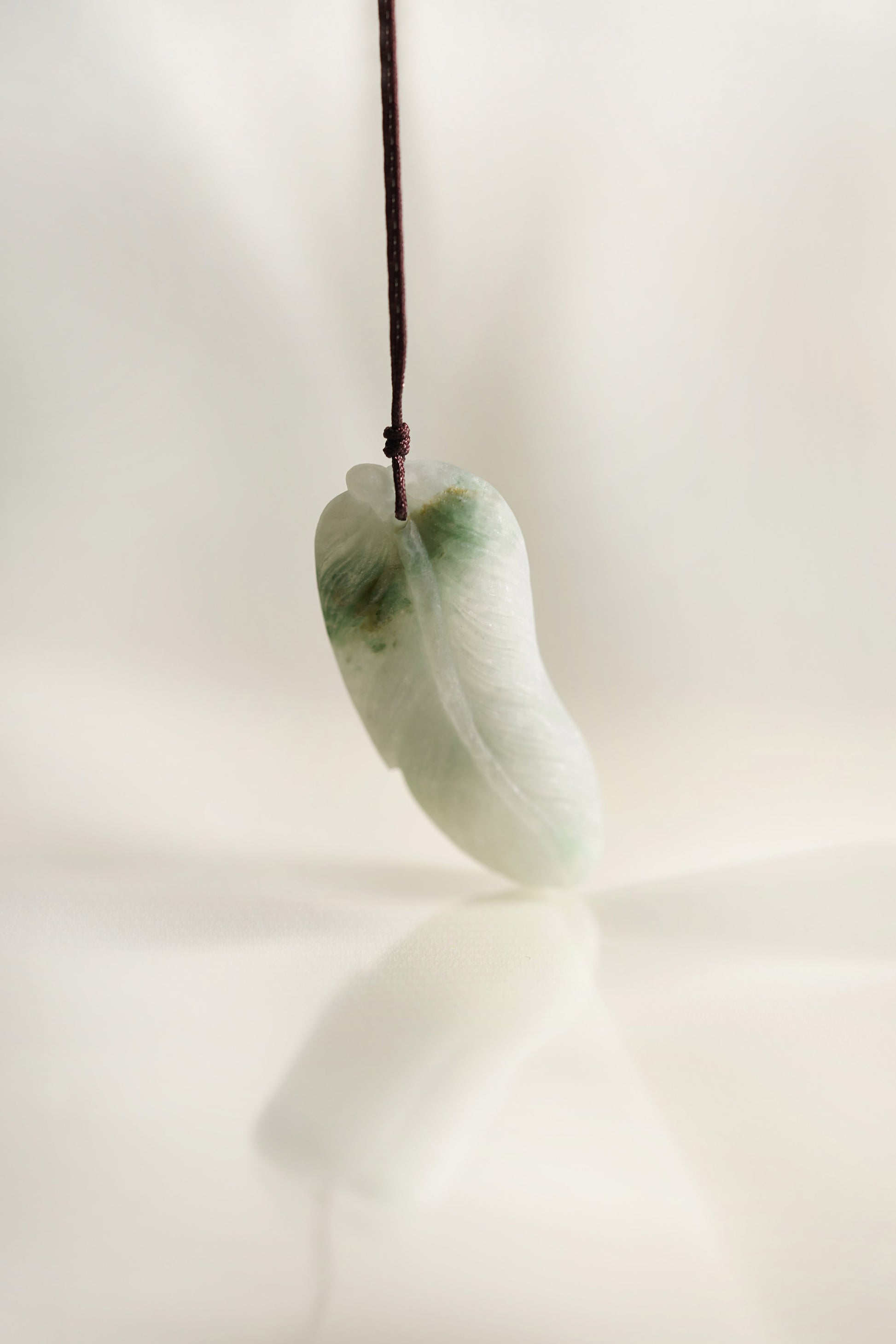 Carved Leaf White Jadeite Pendant with Medium Green patches