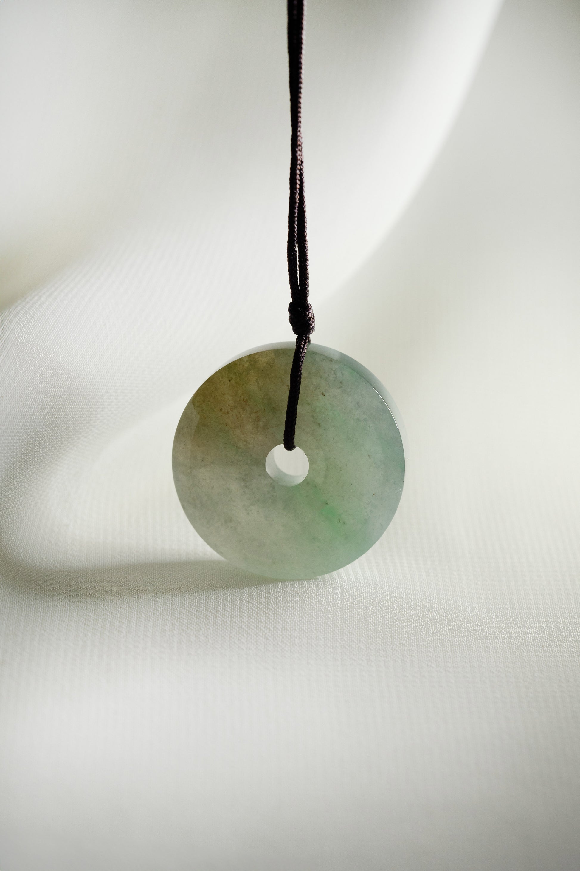 Pale Green Jadeite Zen Doughnut with Medium Green and Brown patches