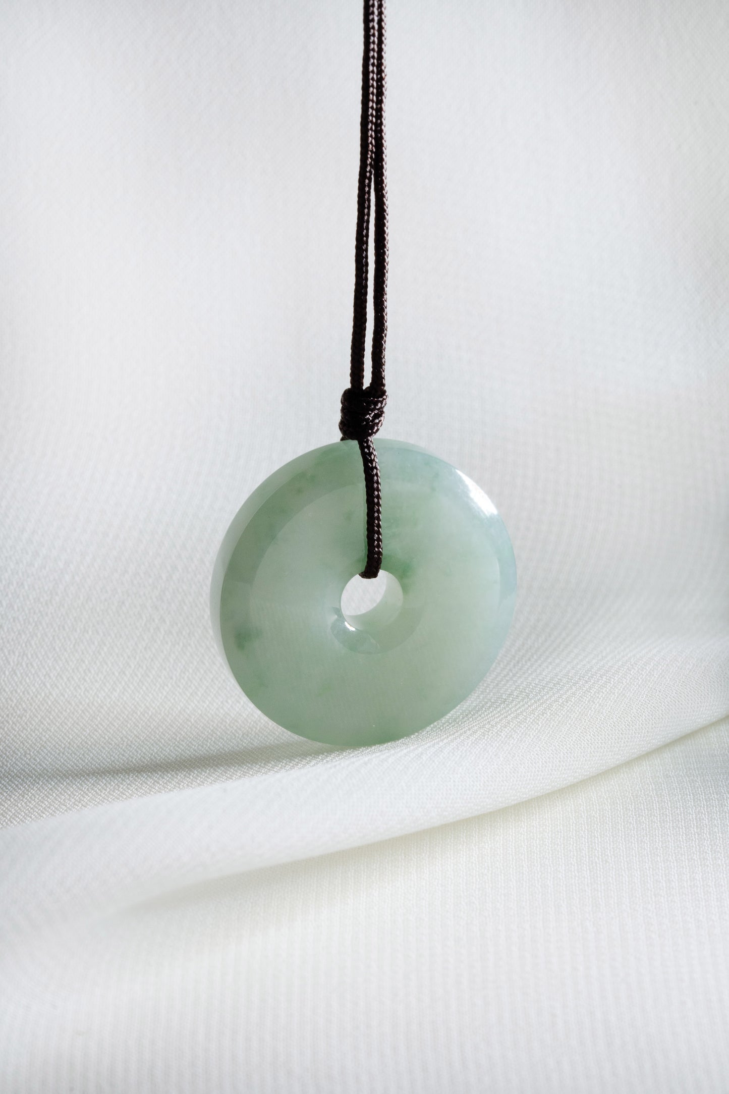 Pale Green Jadeite Zen Doughnut with Bluish Green patches