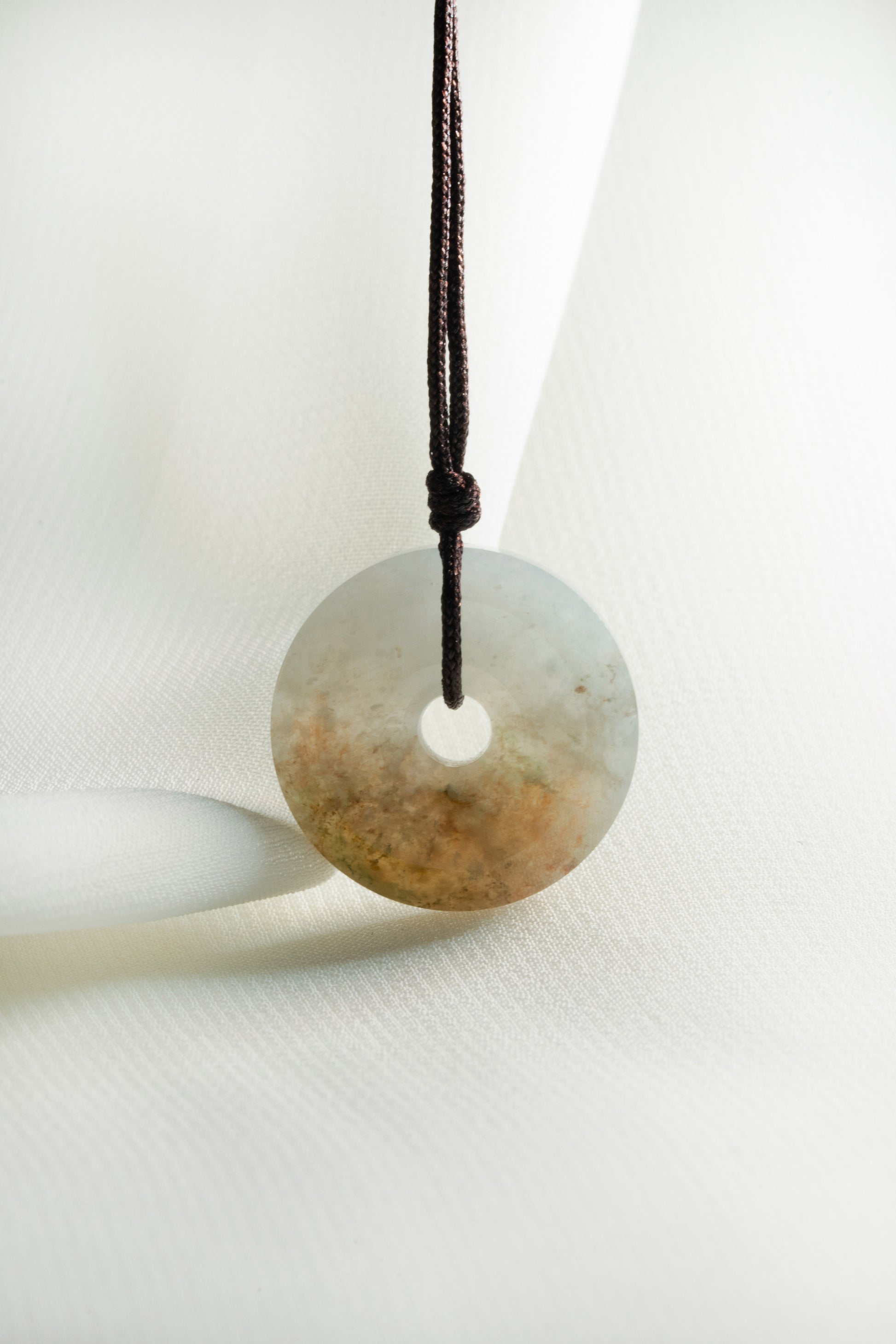 Brownish Yellow Jadeite Zen Doughnut with White Patches