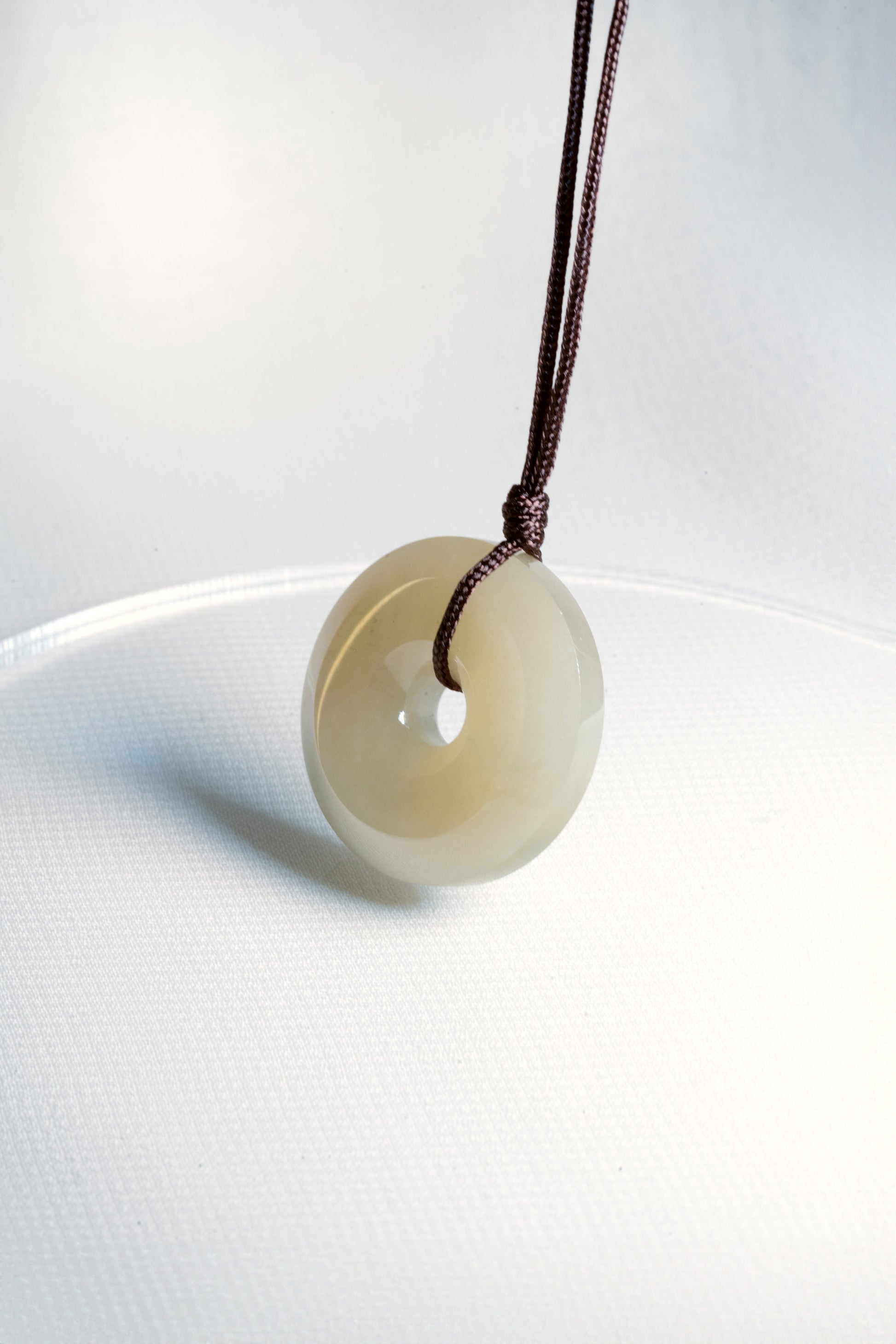 Brownish Yellow Jadeite Zen Doughnut with White patches