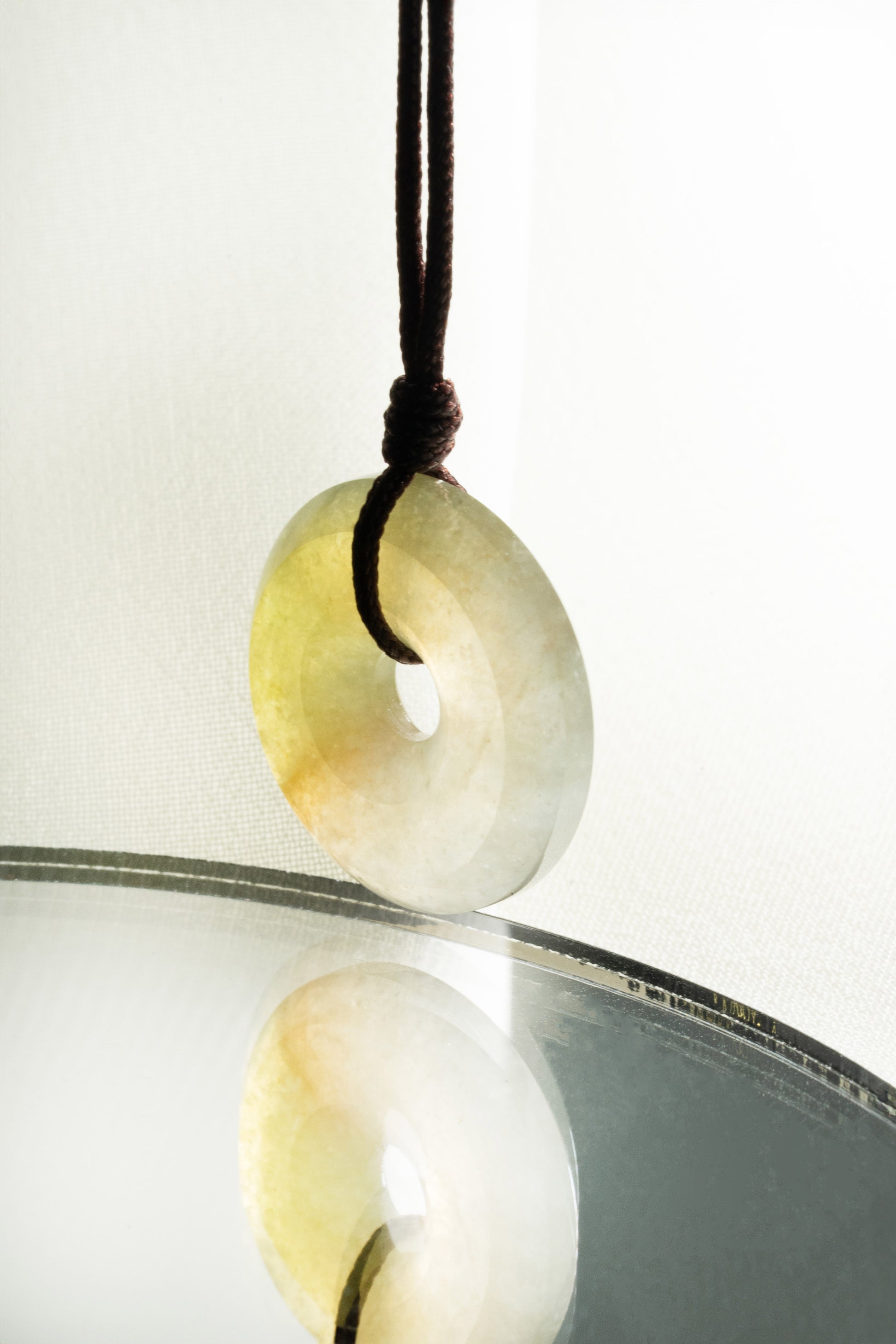 Brownish Yellow Jadeite Zen Doughnut with White patches