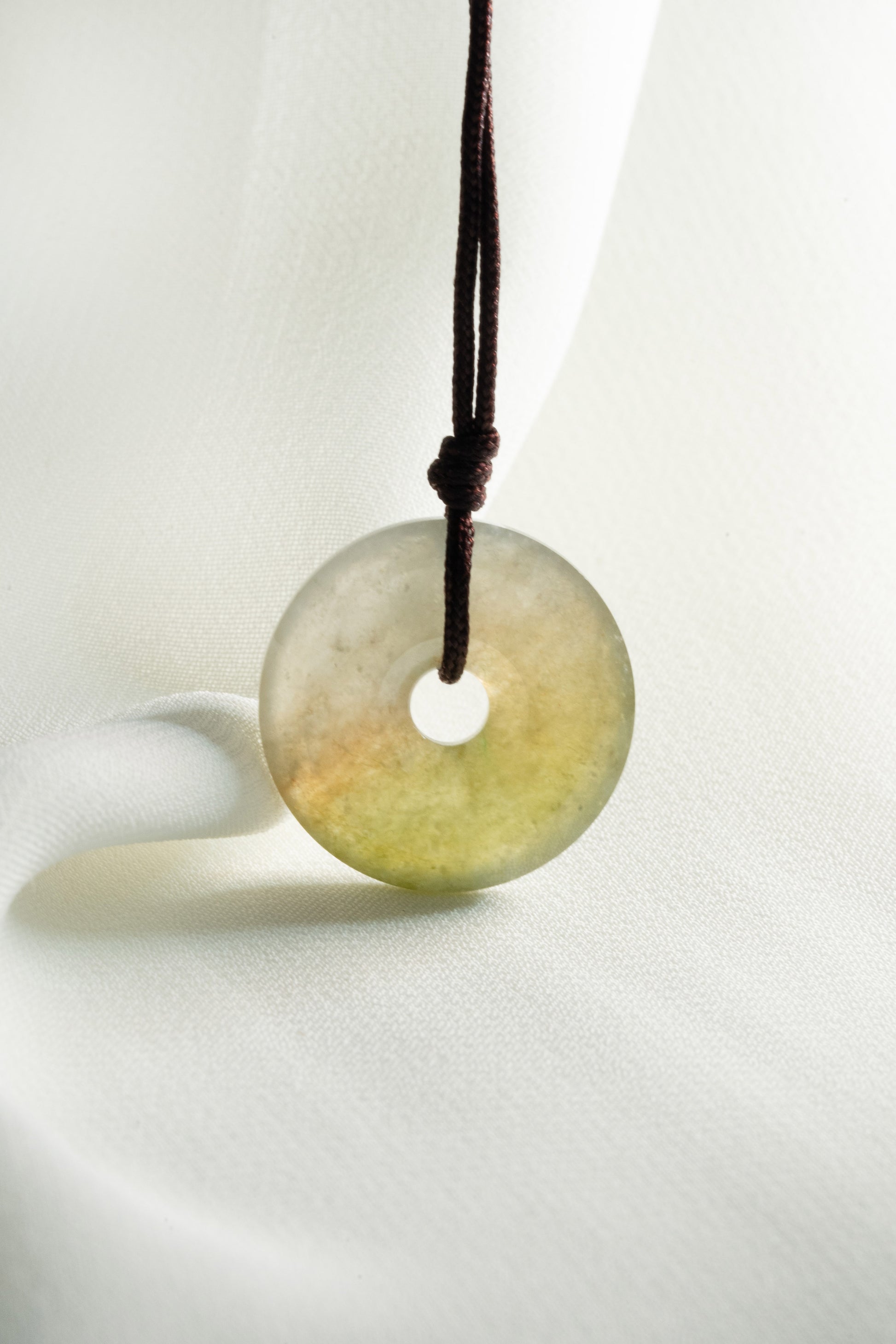 Brownish Yellow Jadeite Zen Doughnut with White patches