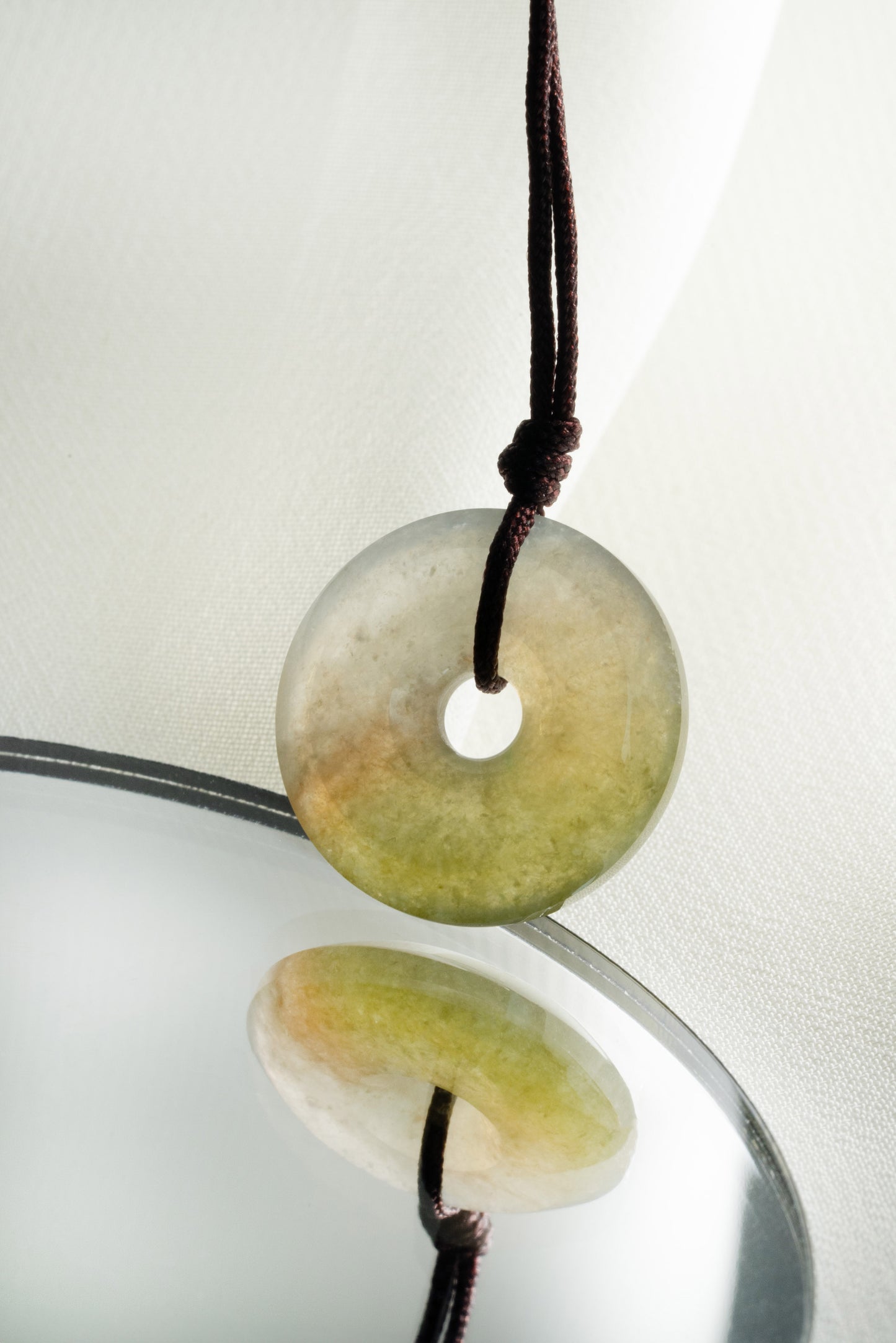 Brownish Yellow Jadeite Zen Doughnut with White patches