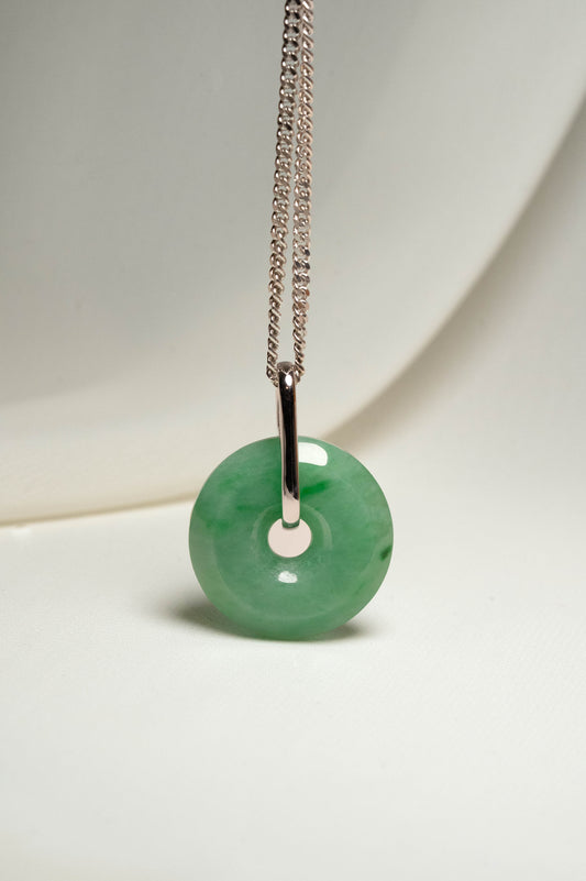 Pale Green Jadeite with Medium and Intense Green patches Zen Doughnut Pendant with 14K White Gold Loop hangs on a 925 Silver Chain