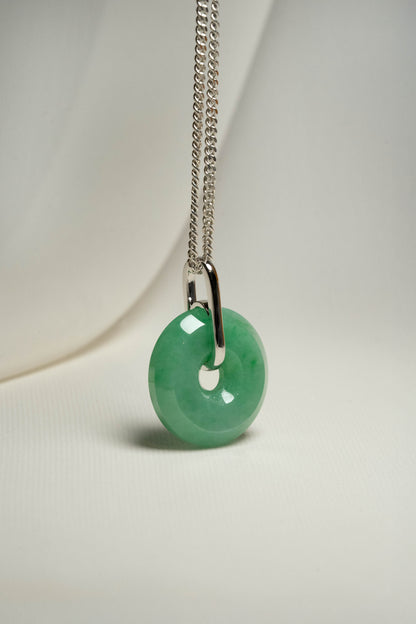 Pale Green Jadeite with Medium and Intense Green patches Zen Doughnut Pendant with 14K White Gold Loop hangs on a 925 Silver Chain