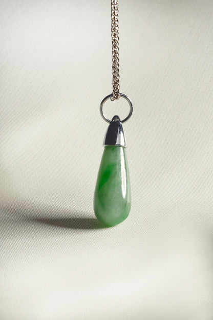 Pale Green Jadeite with Bright Green patches and 18K White Gold hung on a 925 Silver Chain