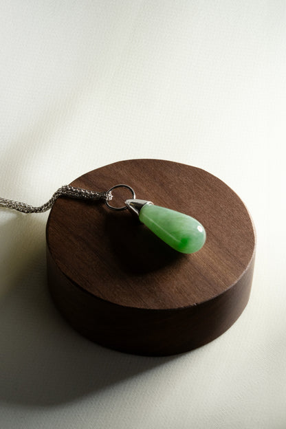 Pale Green Jadeite with Bright Green patches and 18K White Gold hung on a 925 Silver Chain
