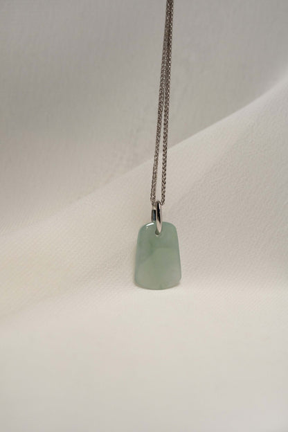 Pale Green Jadeite with Light Green Patches with Platinum Loop hung on a 925 Silver Chain