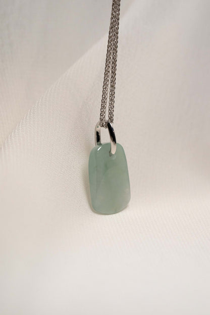 Pale Green Jadeite with Light Green Patches with Platinum Loop hung on a 925 Silver Chain
