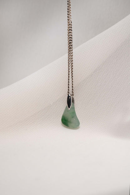 Pale Green Jadeite with Intense Green Patches with Platinum Loop hung on a 925 Silver Chain