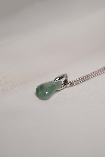 Pale Green Jadeite with Intense Green Patches with Platinum Loop hung on a 925 Silver Chain