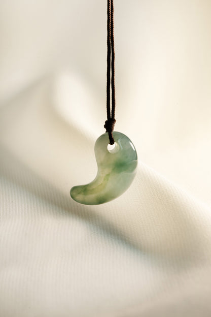 Light Bluish Green Jadeite Comma with Medium Bluish Green patches