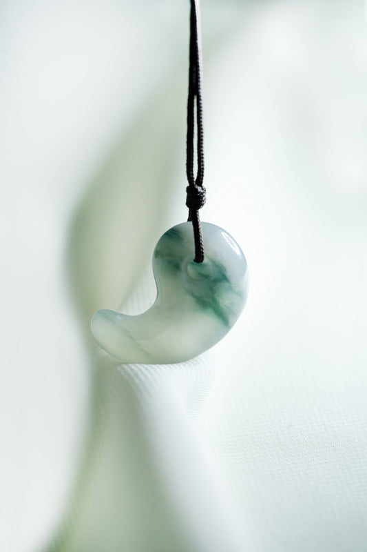 Pale Bluish Green Jadeite Comma with Medium Bluish Green patches