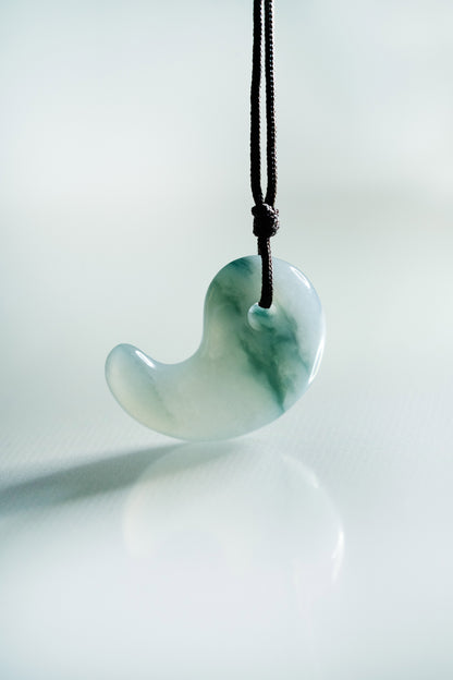 Pale Bluish Green Jadeite Comma with Medium Bluish Green patches