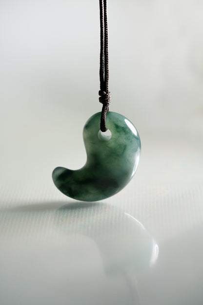 Deep Bluish Green Jadeite Comma with Medium Bluish Green patches