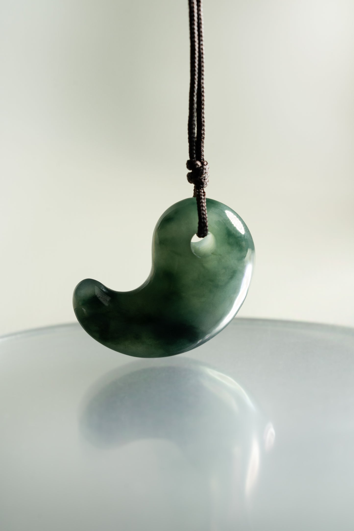 Deep Bluish Green Jadeite Comma with Medium Bluish Green patches