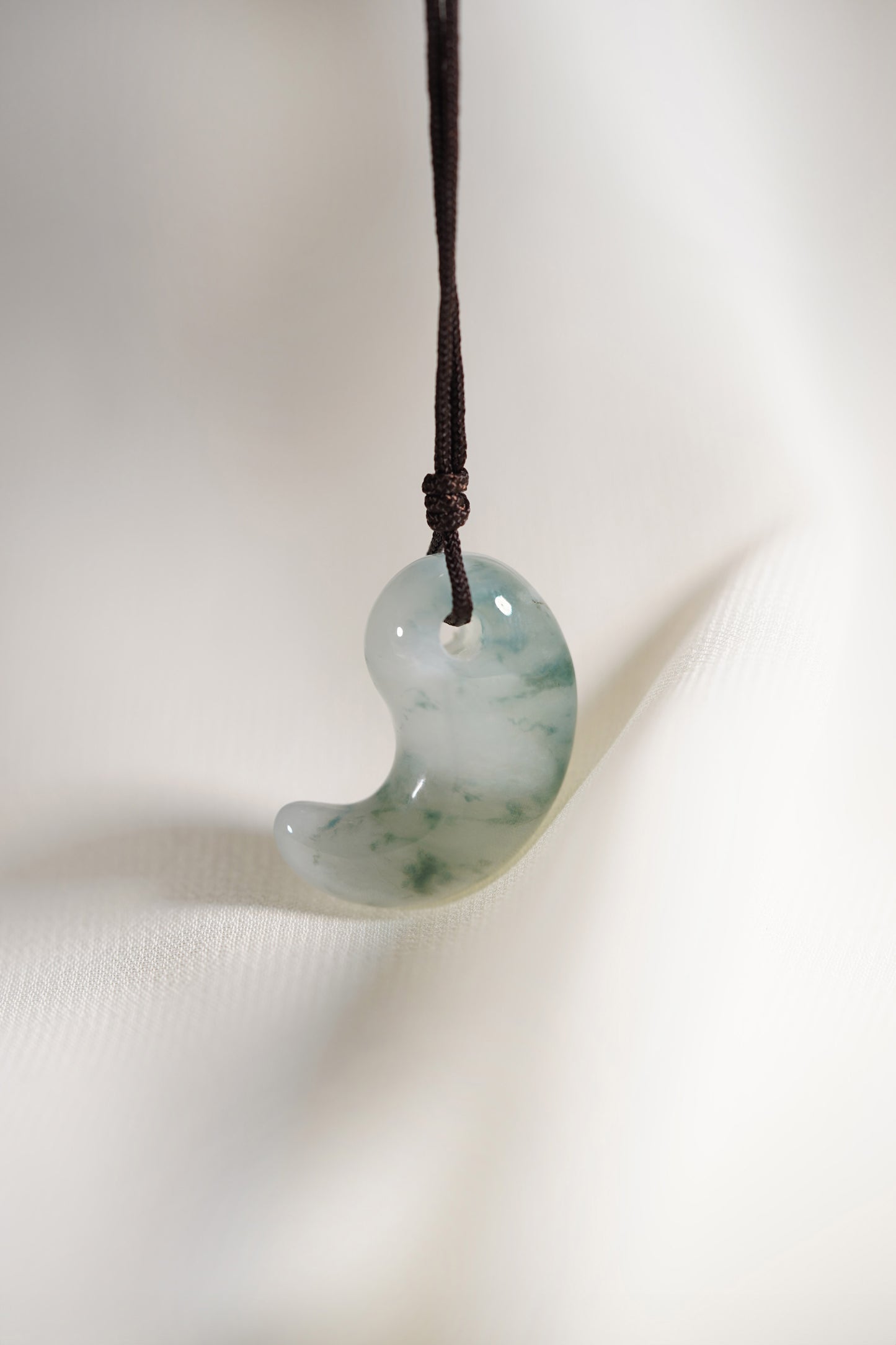 Pale Green Jadeite Comma with Bright Bluish Green patches