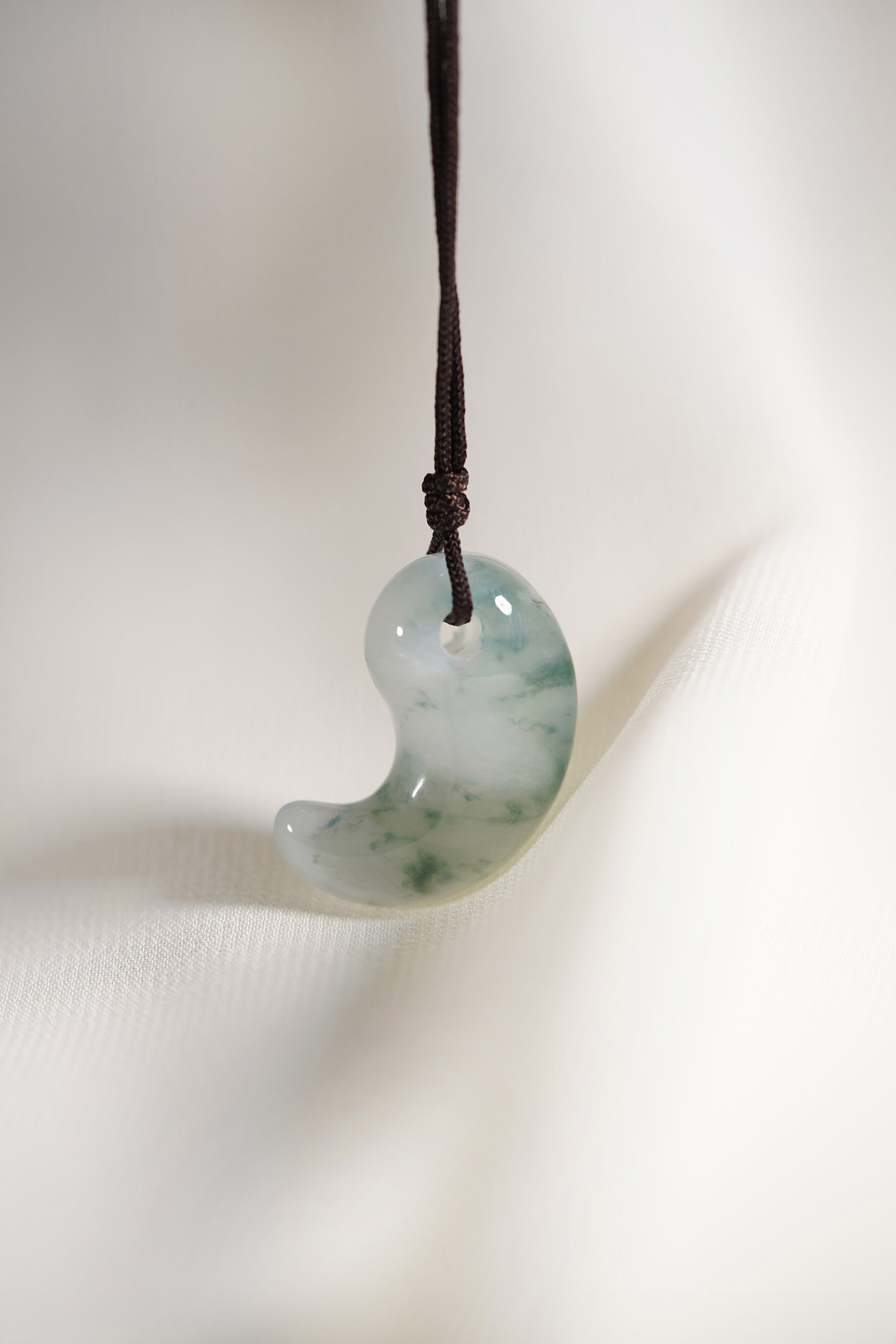 Pale Green Jadeite Comma with Bright Bluish Green patches