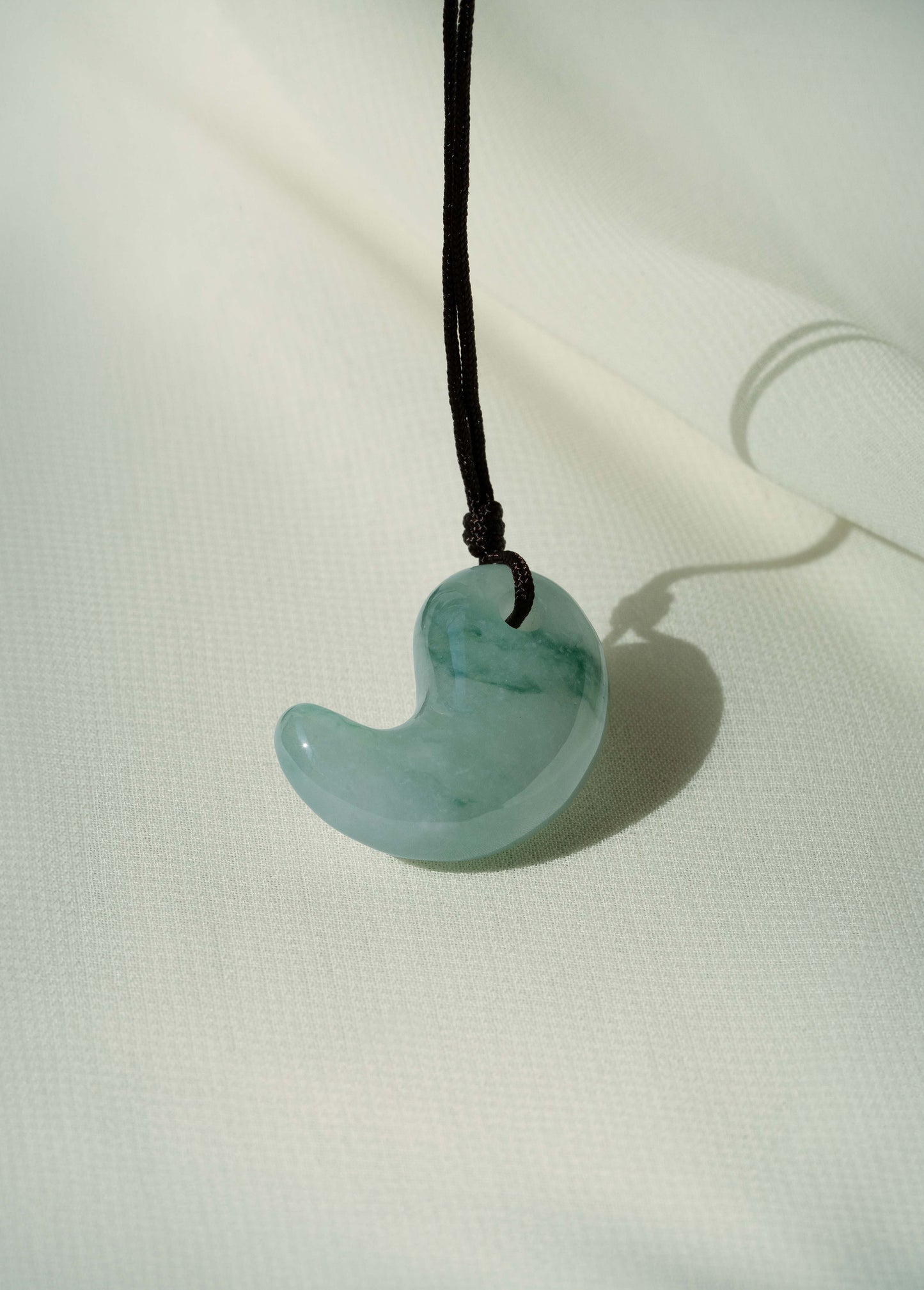Pale Green Jadeite Comma with Bluish Green patches