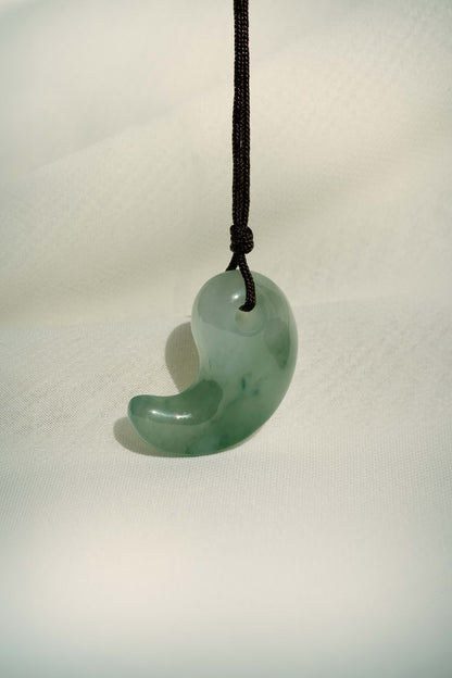 White Jadeite Comma with Bluish Green patches