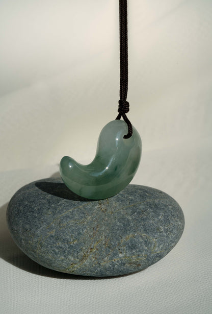 White Jadeite Comma with Bluish Green patches