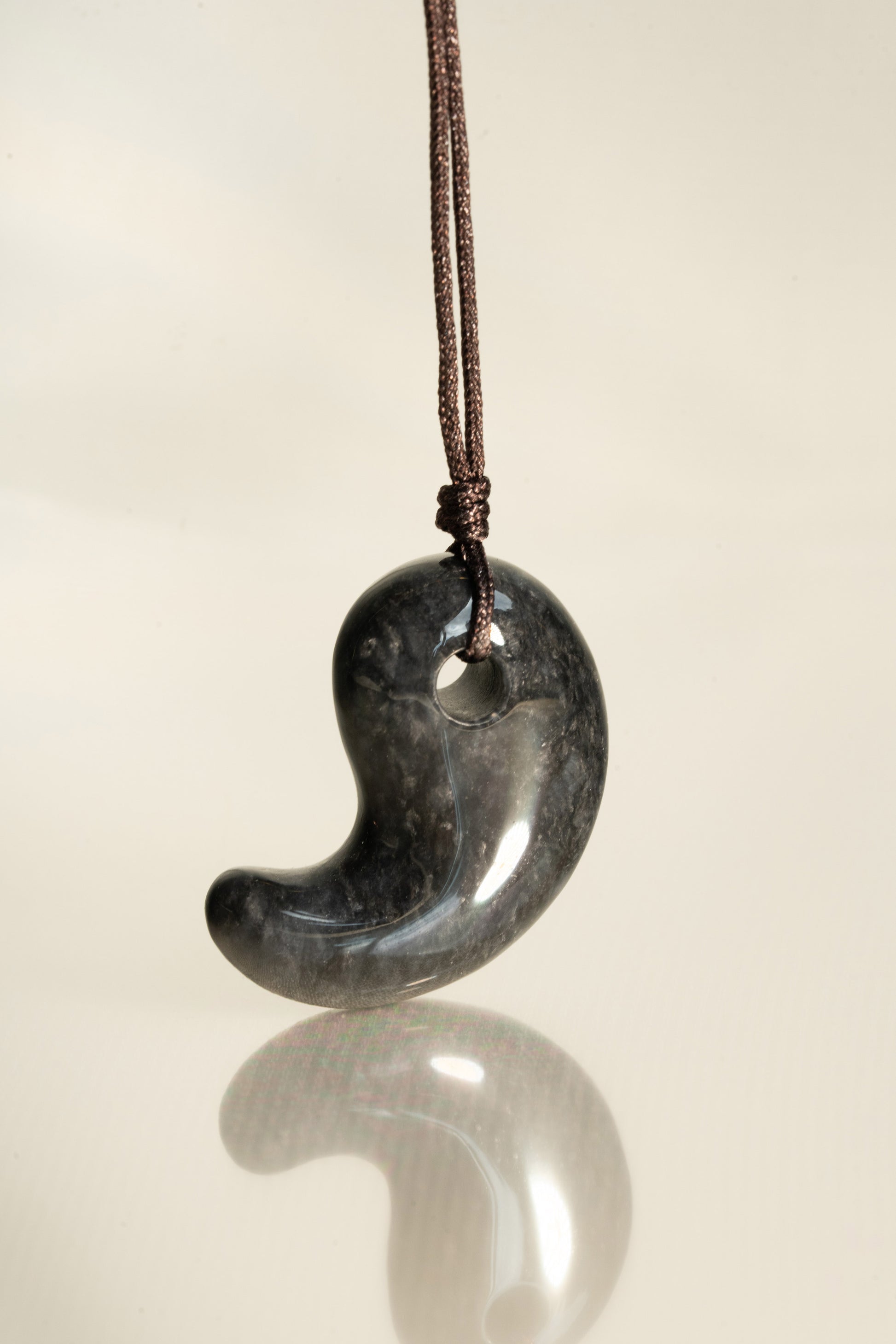 Black Jadeite Comma with Grey spots