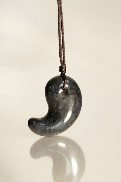 Black Jadeite Comma with Grey spots