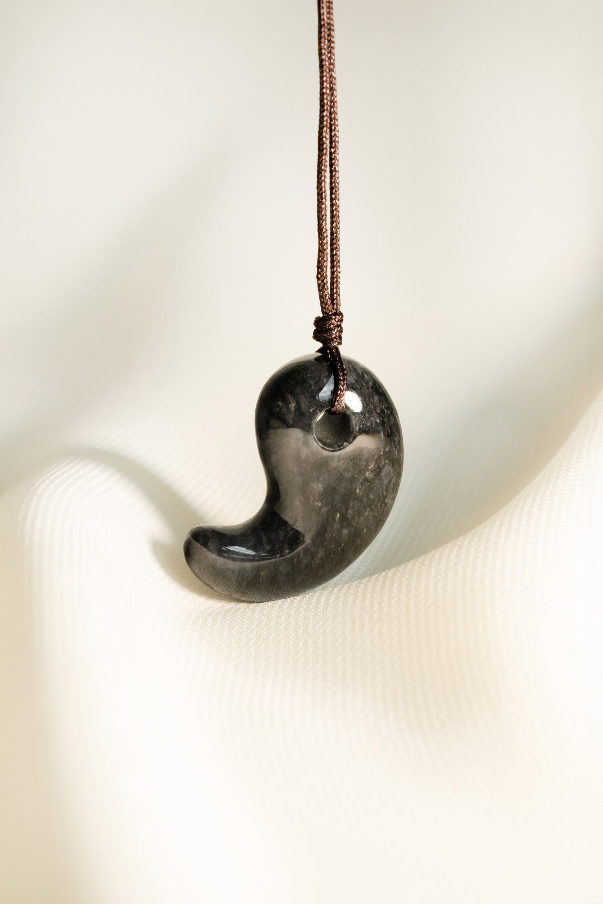 Black Jadeite Comma with Grey spots