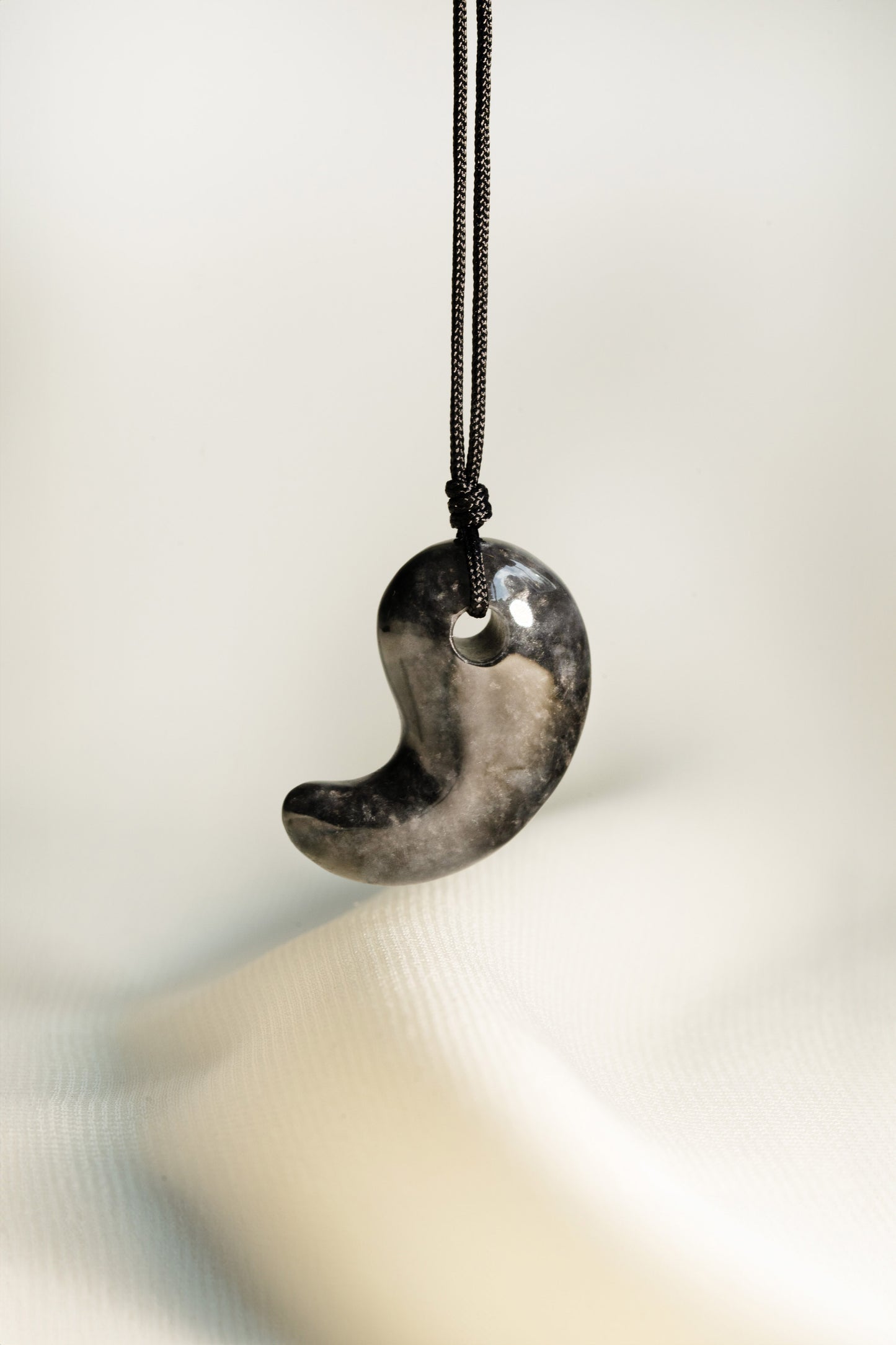 Black Jadeite Comma with Grey spots